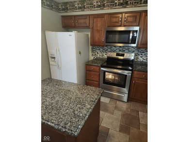 This single-family home is located in a corner of Indianapolis on William Sahm Golf Course in Indiana - for sale on GolfHomes.com, golf home, golf lot