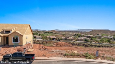 Experience breathtaking views of the city, mountains, and golf on Coral Canyon Golf Course in Utah - for sale on GolfHomes.com, golf home, golf lot