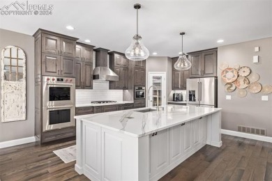 Discover a truly extraordinary residence in the coveted Meridian on Antler Creek Golf Course in Colorado - for sale on GolfHomes.com, golf home, golf lot