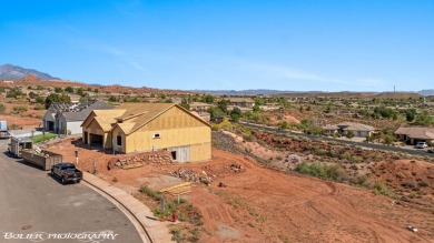 Experience breathtaking views of the city, mountains, and golf on Coral Canyon Golf Course in Utah - for sale on GolfHomes.com, golf home, golf lot