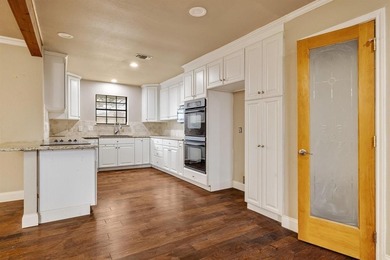 Welcome to 102 Bowie Cove, an exceptional residence nestled on Lake Kiowa Golf Course in Texas - for sale on GolfHomes.com, golf home, golf lot