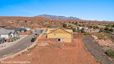 Experience breathtaking views of the city, mountains, and golf on Coral Canyon Golf Course in Utah - for sale on GolfHomes.com, golf home, golf lot