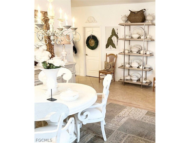 Experience the best of Southwest Florida in this meticulously on Gateway Golf and Country Club in Florida - for sale on GolfHomes.com, golf home, golf lot