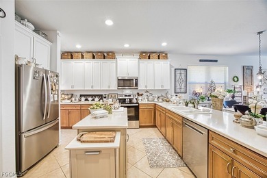 Experience the best of Southwest Florida in this meticulously on Gateway Golf and Country Club in Florida - for sale on GolfHomes.com, golf home, golf lot