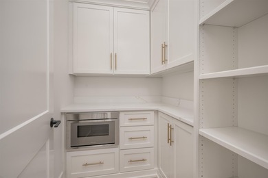 Fabulous new construction lake-oriented cottage, complete with on Reynolds Lake Oconee - The Oconee in Georgia - for sale on GolfHomes.com, golf home, golf lot