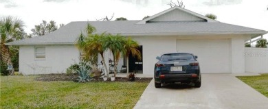 Located in golf community. Residents can fish in the canals on Rotonda Golf and Country Club The Palms Course in Florida - for sale on GolfHomes.com, golf home, golf lot