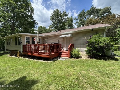 Adorable 3 Bedroom 2 Bath home on double lots with fenced back on Lake Tansi Village Country Club in Tennessee - for sale on GolfHomes.com, golf home, golf lot