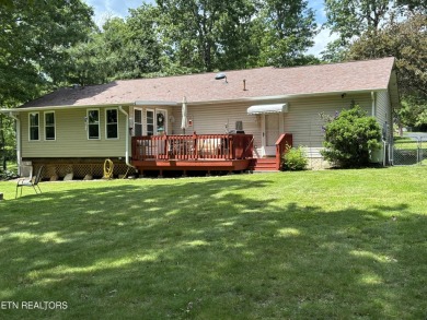 Adorable 3 Bedroom 2 Bath home on double lots with fenced back on Lake Tansi Village Country Club in Tennessee - for sale on GolfHomes.com, golf home, golf lot