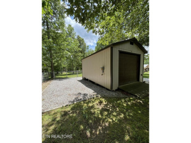 Adorable 3 Bedroom 2 Bath home on double lots with fenced back on Lake Tansi Village Country Club in Tennessee - for sale on GolfHomes.com, golf home, golf lot