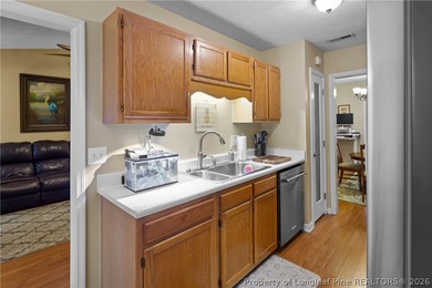 Welcome to this charming 3-bedroom, 2-bath home located in Hope on Hope Mills Golf and Country Club in North Carolina - for sale on GolfHomes.com, golf home, golf lot