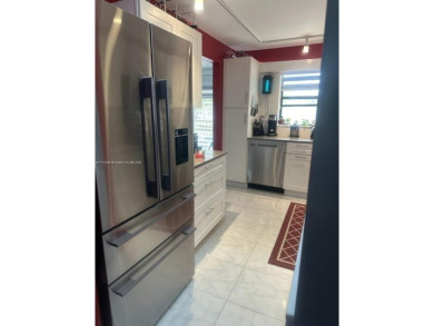 NEWLY REDUCED AND NEGOTIABLE PRICE. CENTRALLY LOCATED UPDATED 1 on Sunrise Lakes Phase IV Golf Course in Florida - for sale on GolfHomes.com, golf home, golf lot