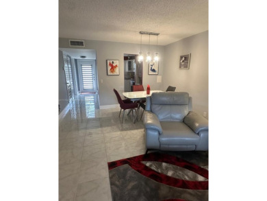 NEWLY REDUCED AND NEGOTIABLE PRICE. CENTRALLY LOCATED UPDATED 1 on Sunrise Lakes Phase IV Golf Course in Florida - for sale on GolfHomes.com, golf home, golf lot