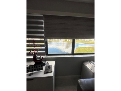 NEWLY REDUCED AND NEGOTIABLE PRICE. CENTRALLY LOCATED UPDATED 1 on Sunrise Lakes Phase IV Golf Course in Florida - for sale on GolfHomes.com, golf home, golf lot