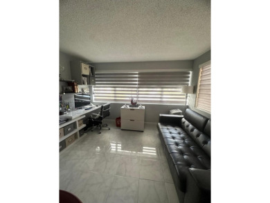 NEWLY REDUCED AND NEGOTIABLE PRICE. CENTRALLY LOCATED UPDATED 1 on Sunrise Lakes Phase IV Golf Course in Florida - for sale on GolfHomes.com, golf home, golf lot