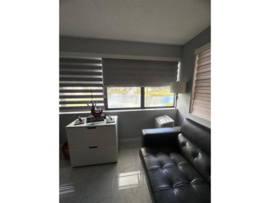 NEWLY REDUCED AND NEGOTIABLE PRICE. CENTRALLY LOCATED UPDATED 1 on Sunrise Lakes Phase IV Golf Course in Florida - for sale on GolfHomes.com, golf home, golf lot