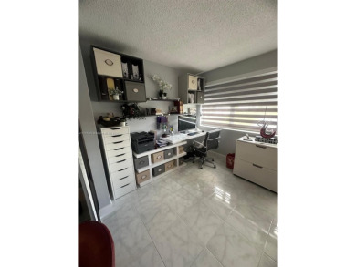 NEWLY REDUCED AND NEGOTIABLE PRICE. CENTRALLY LOCATED UPDATED 1 on Sunrise Lakes Phase IV Golf Course in Florida - for sale on GolfHomes.com, golf home, golf lot