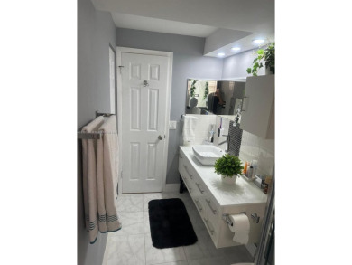 NEWLY REDUCED AND NEGOTIABLE PRICE. CENTRALLY LOCATED UPDATED 1 on Sunrise Lakes Phase IV Golf Course in Florida - for sale on GolfHomes.com, golf home, golf lot