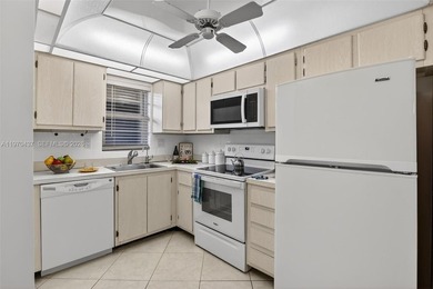 2BR / 2BA condo on the 3rd floor with updated bathrooms and a on Grande Oaks Golf Club in Florida - for sale on GolfHomes.com, golf home, golf lot