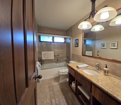 This spacious and beautifully upgraded 2-bedroom, 2-bathroom on Kona Country Club Golf Course in Hawaii - for sale on GolfHomes.com, golf home, golf lot