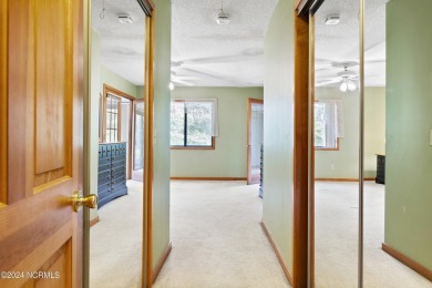 Welcome Home to this lovely Inland Greens townhouse centrally on Inland Greens Golf Course in North Carolina - for sale on GolfHomes.com, golf home, golf lot