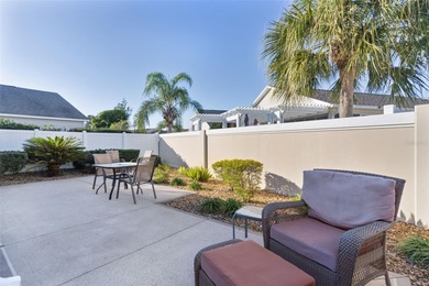 Under contract-accepting backup offers. Welcome home to this on Cane Garden Golf Course - Sumter in Florida - for sale on GolfHomes.com, golf home, golf lot