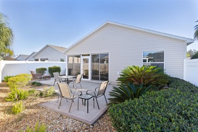 Under contract-accepting backup offers. Welcome home to this on Cane Garden Golf Course - Sumter in Florida - for sale on GolfHomes.com, golf home, golf lot