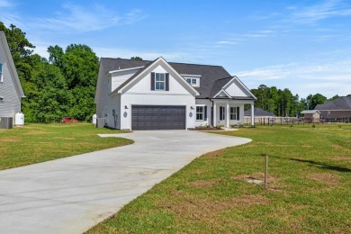 This Modern Farmhouse is under construction and will be on Shaftesbury Glen Golf and Fish Club in South Carolina - for sale on GolfHomes.com, golf home, golf lot