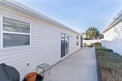 Under contract-accepting backup offers. Welcome home to this on Cane Garden Golf Course - Sumter in Florida - for sale on GolfHomes.com, golf home, golf lot