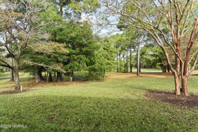 Welcome Home to this lovely Inland Greens townhouse centrally on Inland Greens Golf Course in North Carolina - for sale on GolfHomes.com, golf home, golf lot