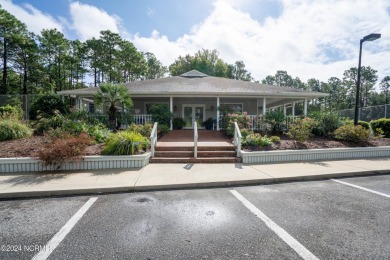 Welcome Home to this lovely Inland Greens townhouse centrally on Inland Greens Golf Course in North Carolina - for sale on GolfHomes.com, golf home, golf lot