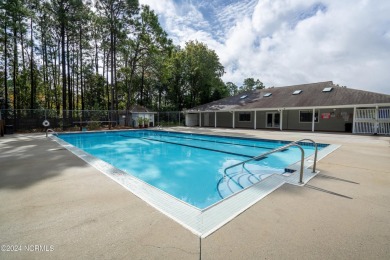 Welcome Home to this lovely Inland Greens townhouse centrally on Inland Greens Golf Course in North Carolina - for sale on GolfHomes.com, golf home, golf lot