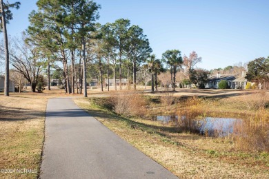 Welcome Home to this lovely Inland Greens townhouse centrally on Inland Greens Golf Course in North Carolina - for sale on GolfHomes.com, golf home, golf lot