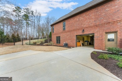 Welcome to this hard-to-find custom 5-bedroom, 4.5-bathroom on Traditions of Braselton Golf Club in Georgia - for sale on GolfHomes.com, golf home, golf lot