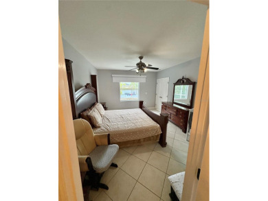 Beautiful Lakefront Pool Home..Welcome to this stunning on Imperial Lakewoods Golf Club in Florida - for sale on GolfHomes.com, golf home, golf lot