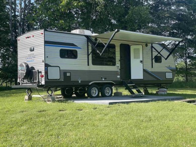 Great camping or building spot in Sugar Springs. Why search for on Sugar Springs Country Club in Michigan - for sale on GolfHomes.com, golf home, golf lot