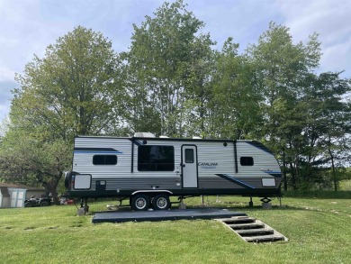 Great camping or building spot in Sugar Springs. Why search for on Sugar Springs Country Club in Michigan - for sale on GolfHomes.com, golf home, golf lot