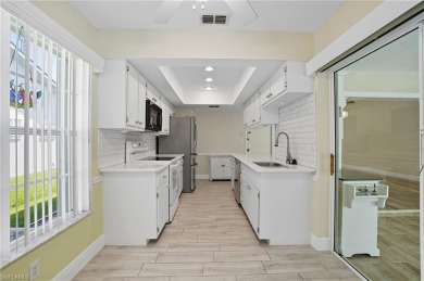 Nestled in the sought-after gated community of Sabal Springs on Sabal Springs Golf and Racquet Club in Florida - for sale on GolfHomes.com, golf home, golf lot