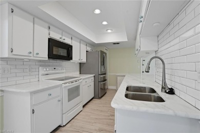 Nestled in the sought-after gated community of Sabal Springs on Sabal Springs Golf and Racquet Club in Florida - for sale on GolfHomes.com, golf home, golf lot