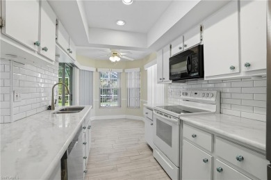 Nestled in the sought-after gated community of Sabal Springs on Sabal Springs Golf and Racquet Club in Florida - for sale on GolfHomes.com, golf home, golf lot