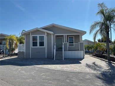 NO LOT RENT!! YOU OWN THE LAND!! Beautifully updated home in the on Southern Dunes Golf and Country Club in Florida - for sale on GolfHomes.com, golf home, golf lot