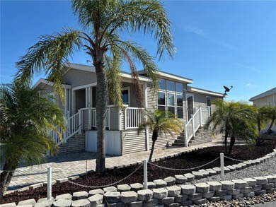 NO LOT RENT!! YOU OWN THE LAND!! Beautifully updated home in the on Southern Dunes Golf and Country Club in Florida - for sale on GolfHomes.com, golf home, golf lot