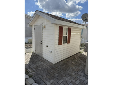 NO LOT RENT!! YOU OWN THE LAND!! Beautifully updated home in the on Southern Dunes Golf and Country Club in Florida - for sale on GolfHomes.com, golf home, golf lot