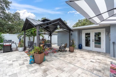 Welcome to your private oasis in the heart of highly on The Dunedin Country Club in Florida - for sale on GolfHomes.com, golf home, golf lot