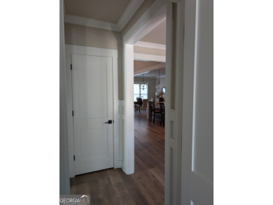 Welcome home - a charming 5 bedroom, 3.5 bath, Craftsman home on Traditions of Braselton Golf Club in Georgia - for sale on GolfHomes.com, golf home, golf lot