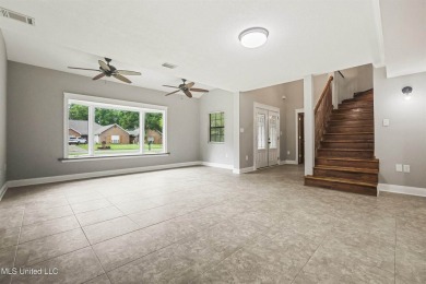 Welcome to your dream home! This beautifully renovated 5-bedroom on Mississippi National Golf Course in Mississippi - for sale on GolfHomes.com, golf home, golf lot