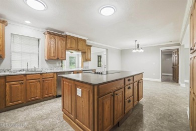 Welcome to your dream home! This beautifully renovated 5-bedroom on Mississippi National Golf Course in Mississippi - for sale on GolfHomes.com, golf home, golf lot