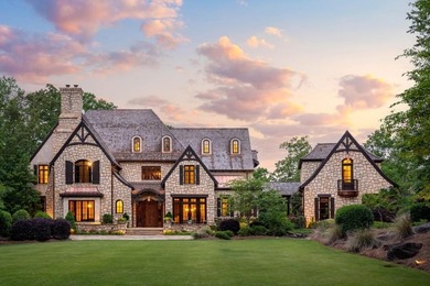 Now accepting Bitcoin. A triumph of architectural artistry on Alpharetta Athletic Club West in Georgia - for sale on GolfHomes.com, golf home, golf lot