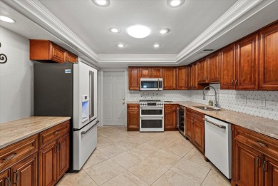 This beautifully renovated villa on a desirable corner lot in on Palm Aire Country Club of Sarasota in Florida - for sale on GolfHomes.com, golf home, golf lot
