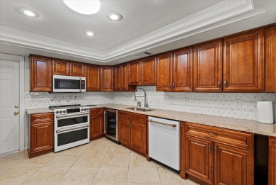 This beautifully renovated villa on a desirable corner lot in on Palm Aire Country Club of Sarasota in Florida - for sale on GolfHomes.com, golf home, golf lot