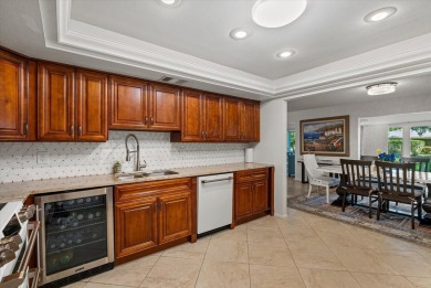 This beautifully renovated villa on a desirable corner lot in on Palm Aire Country Club of Sarasota in Florida - for sale on GolfHomes.com, golf home, golf lot